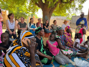 Vive teachers with villagers at event